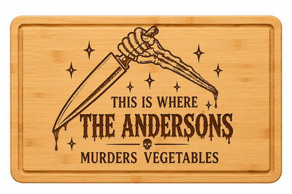 Personalized spooky Halloween cutting board laser engraved with a custom name on bamboo