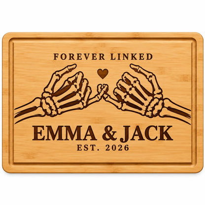 Personalized Halloween cutting board for couples engraved with names and date on bamboo